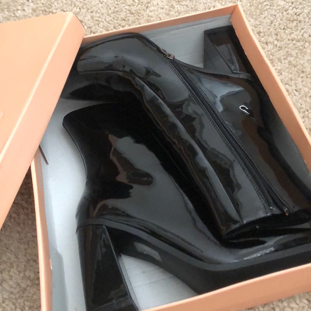 Black patent leather heeled boots